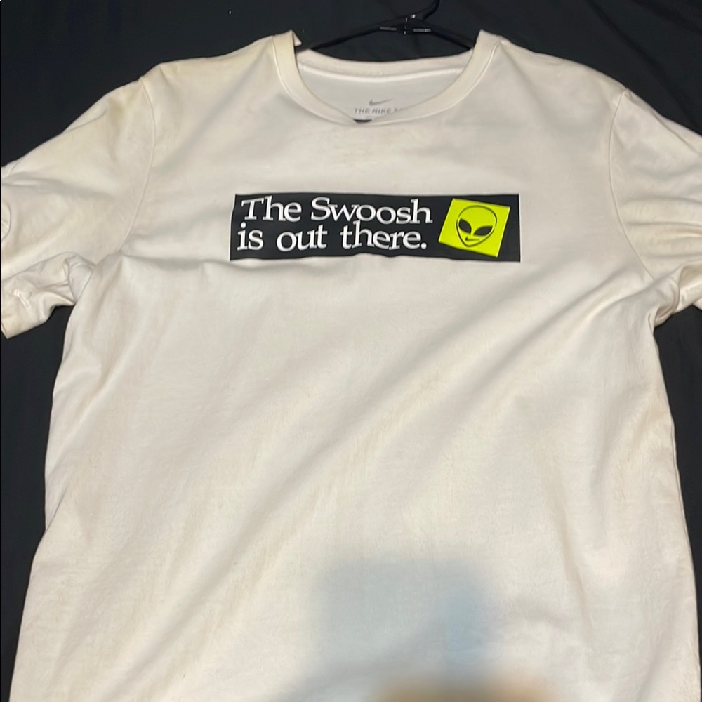 Nike White Short Sleeve Tee with Distinctive Design